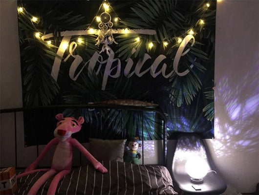 Black tapestry with white constellations and a large grey moon hanging above a bed in a bedroom. - Image 20