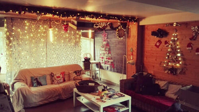 Black tapestry with white constellations and a large grey moon hanging above a bed in a bedroom. - Image 24