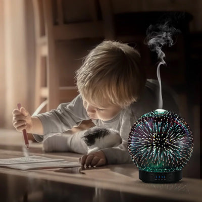 Spherical 3D aromatherapy essential oil diffuser with 7 LED color lighting modes and a black base. - Image 8
