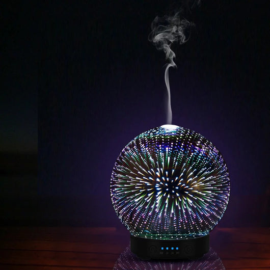 Spherical 3D aromatherapy essential oil diffuser with 7 LED color lighting modes and a black base. - Image 9