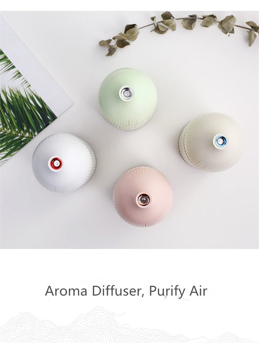 Pink ribbed aromatherapy diffuser and ultrasonic humidifier with a transparent brown base and control buttons. - Image 7