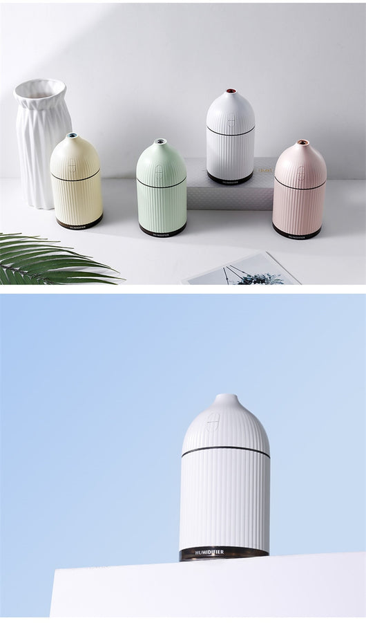 Pink ribbed aromatherapy diffuser and ultrasonic humidifier with a transparent brown base and control buttons. - Image 21