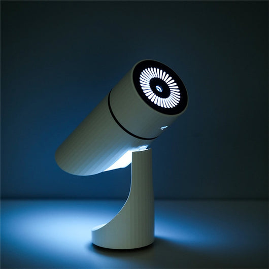 Teal cylindrical USB charging humidifier with a ribbed texture, black water level indicator, and two control buttons. - Image 14