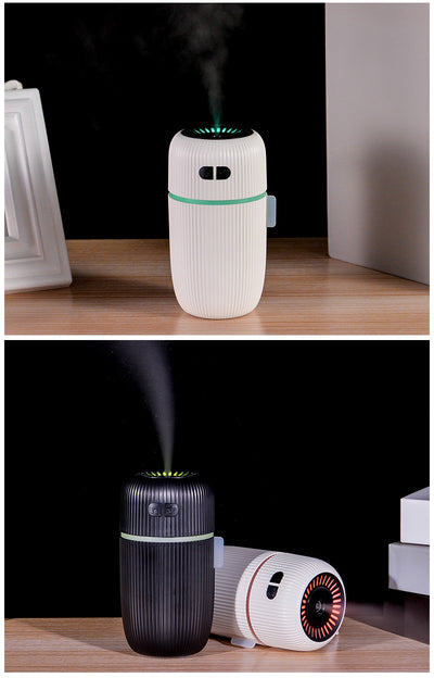 Black ribbed white noise humidifier with control buttons on top, designed to aid sleep and humidify. - Image 8