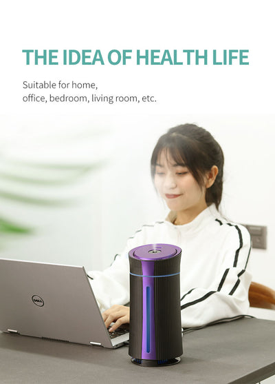 Black and purple columnar mini USB humidifier with ribbed texture and visible water level indicator. - Image 14