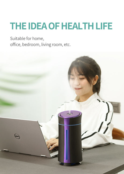 Black and purple columnar mini USB humidifier with ribbed texture and visible water level indicator. - Image 14