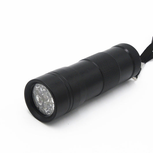 Linterna LED Multiusos con Luz Ultravioleta - Image 9