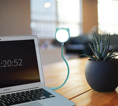 Black cat-shaped USB desk lamp with a flexible gooseneck and silver light panel, ideal for modern desks. - Image 4