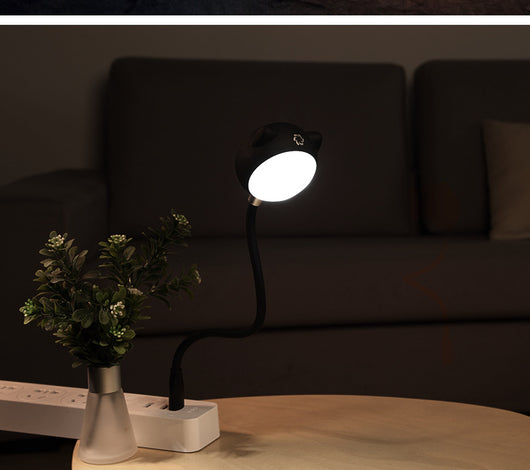 Black cat-shaped USB desk lamp with a flexible gooseneck and silver light panel, ideal for modern desks. - Image 6