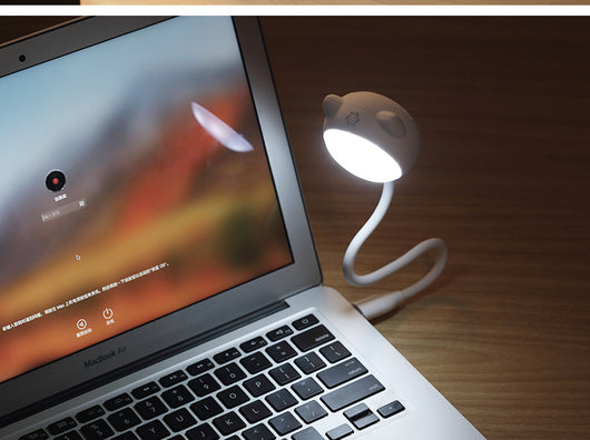 Black cat-shaped USB desk lamp with a flexible gooseneck and silver light panel, ideal for modern desks. - Image 7