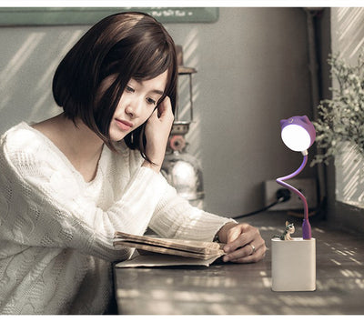 Black cat-shaped USB desk lamp with a flexible gooseneck and silver light panel, ideal for modern desks. - Image 9