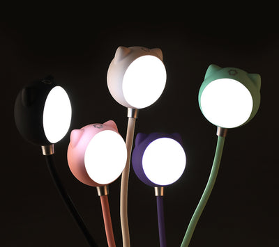 Black cat-shaped USB desk lamp with a flexible gooseneck and silver light panel, ideal for modern desks. - Image 10