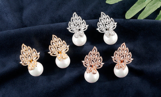Aretes de Perla con Patrón Calado Elegante - Image 12