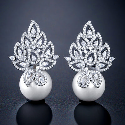 Aretes de Perla con Patrón Calado Elegante - Image 13