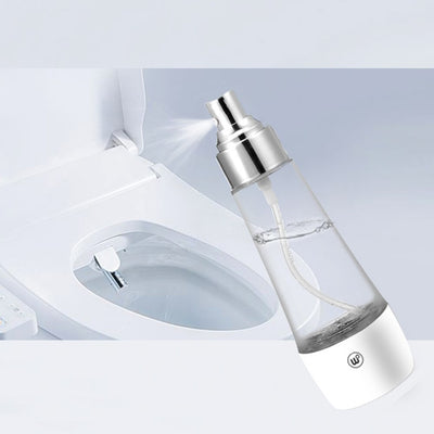 Electrolytic sterilization water making machine in a clear and white spray bottle with a silver nozzle. - Image 9