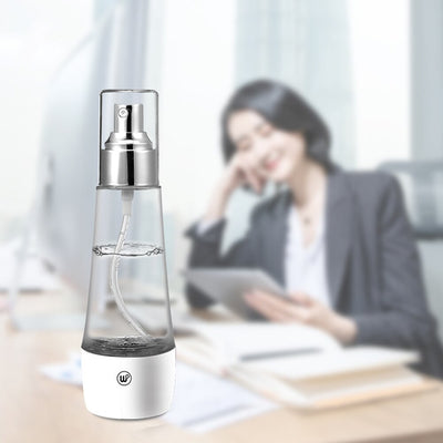 Electrolytic sterilization water making machine in a clear and white spray bottle with a silver nozzle. - Image 13