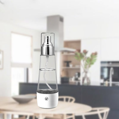 Electrolytic sterilization water making machine in a clear and white spray bottle with a silver nozzle. - Image 14