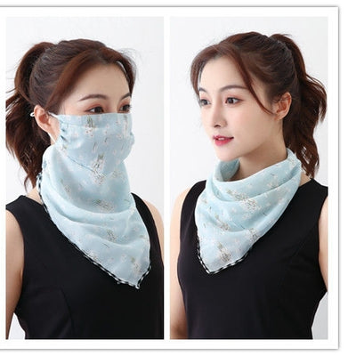 White women's UV protection scarf with black speckle pattern, worn as a face mask and neck scarf. - Image 22