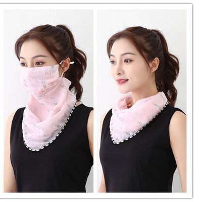 White women's UV protection scarf with black speckle pattern, worn as a face mask and neck scarf. - Image 27
