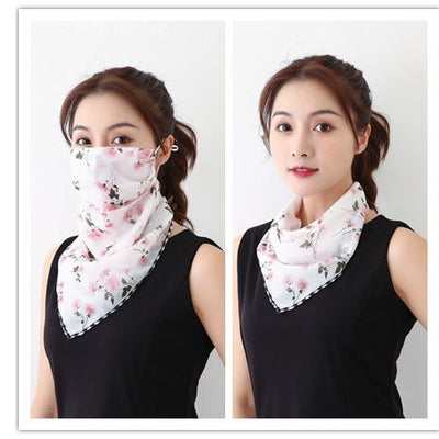 White women's UV protection scarf with black speckle pattern, worn as a face mask and neck scarf. - Image 28