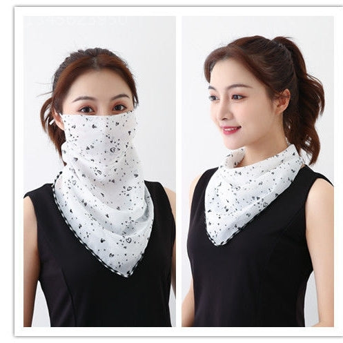 White women's UV protection scarf with black speckle pattern, worn as a face mask and neck scarf. - Image 29