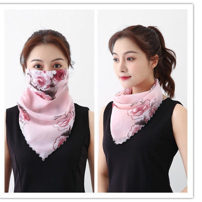 White women's UV protection scarf with black speckle pattern, worn as a face mask and neck scarf. - Image 30