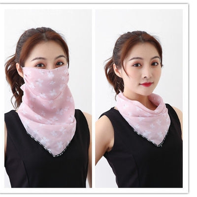 White women's UV protection scarf with black speckle pattern, worn as a face mask and neck scarf. - Image 34