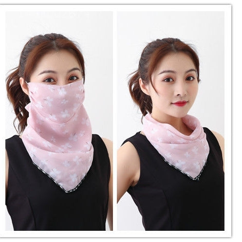 White women's UV protection scarf with black speckle pattern, worn as a face mask and neck scarf. - Image 34
