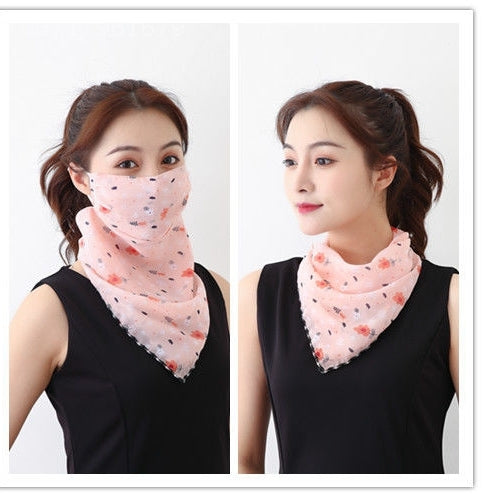 White women's UV protection scarf with black speckle pattern, worn as a face mask and neck scarf. - Image 36