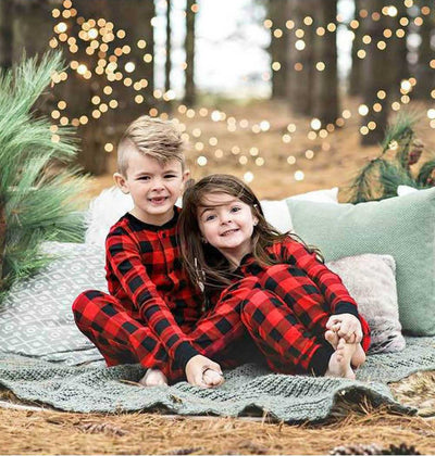 Red and black buffalo plaid baby romper with long sleeves, snap front closure, and black ribbed cuffs and collar. - Image 15