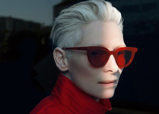 White vintage cat-eye sunglasses with dark lenses, angled on a clean white background. - Image 7