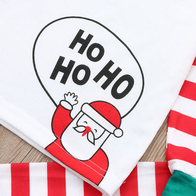 White, red, and green striped pajama set with a cartoon Santa Claus and "HO HO HO" text on the top. - Image 11