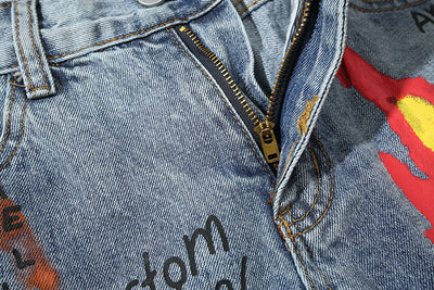 Jeans Rotos con Estilo Graffiti - Image 18