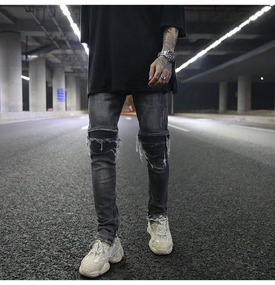Jeans ajustados con rotos diseñados - Image 18