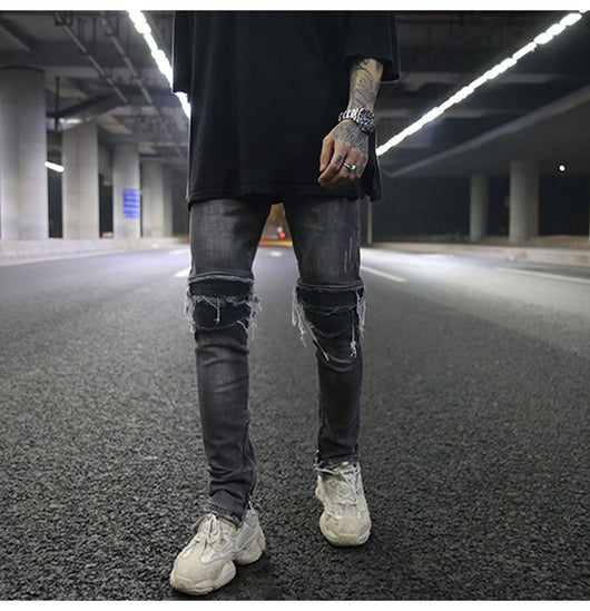 Jeans ajustados con rotos diseñados - Image 18