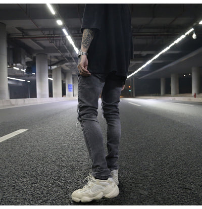 Jeans ajustados con rotos diseñados - Image 20