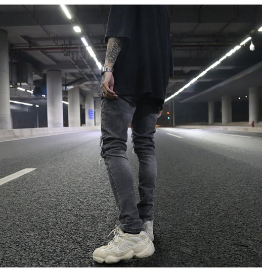 Jeans ajustados con rotos diseñados - Image 20