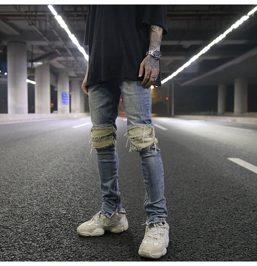 Jeans ajustados con rotos diseñados - Image 23