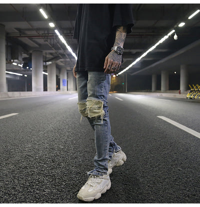 Jeans ajustados con rotos diseñados - Image 24