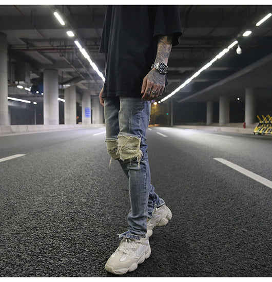 Jeans ajustados con rotos diseñados - Image 24