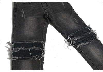 Jeans ajustados con rotos diseñados - Image 29