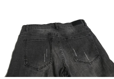Jeans ajustados con rotos diseñados - Image 31