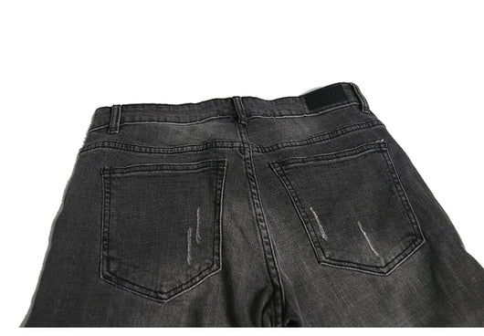 Jeans ajustados con rotos diseñados - Image 31