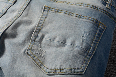 Jeans Slim Fit con Parches de Pliegues Modernos - Image 13