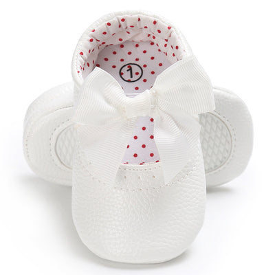 Pink baby soft sole princess shoes with a decorative bow and red polka dot lining, perfect for infants. - Image 13
