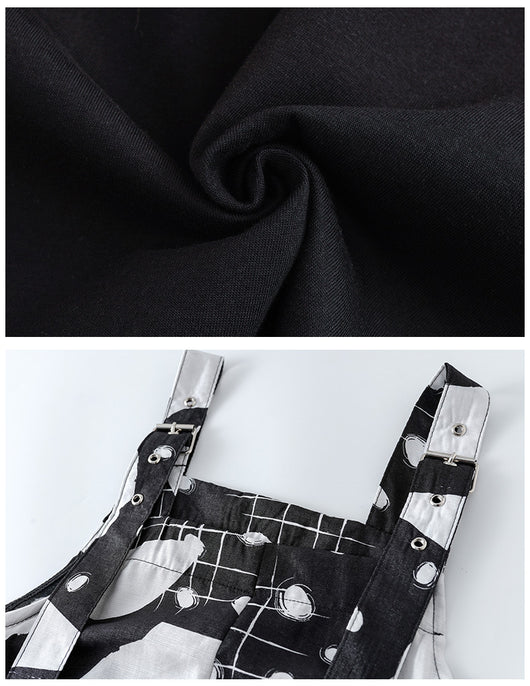 Girls' two-piece outfit with a black sleeveless top and black and white camouflage wide-leg suspender pants. - Image 12