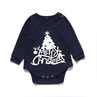 Matching navy blue family Christmas pajamas with white Christmas tree and "Merry Christmas" text, paired with patterned bottoms. - Image 9