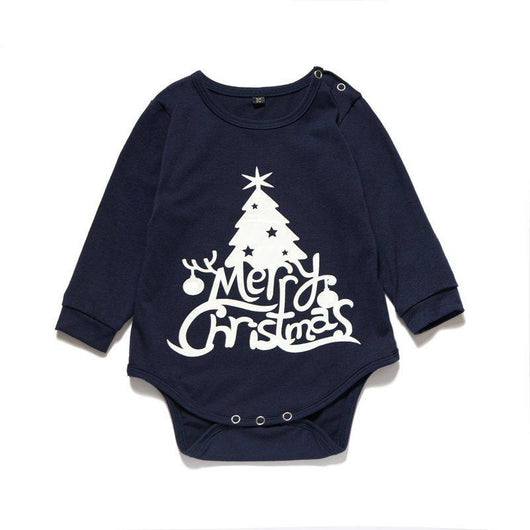 Matching navy blue family Christmas pajamas with white Christmas tree and "Merry Christmas" text, paired with patterned bottoms. - Image 9