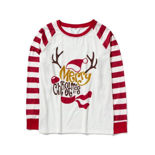 Matching navy blue family Christmas pajamas with white Christmas tree and "Merry Christmas" text, paired with patterned bottoms. - Image 12