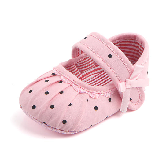 Black baby girl Mary Jane shoes with white polka dots, a strap, bow accent, and striped lining. - Image 17